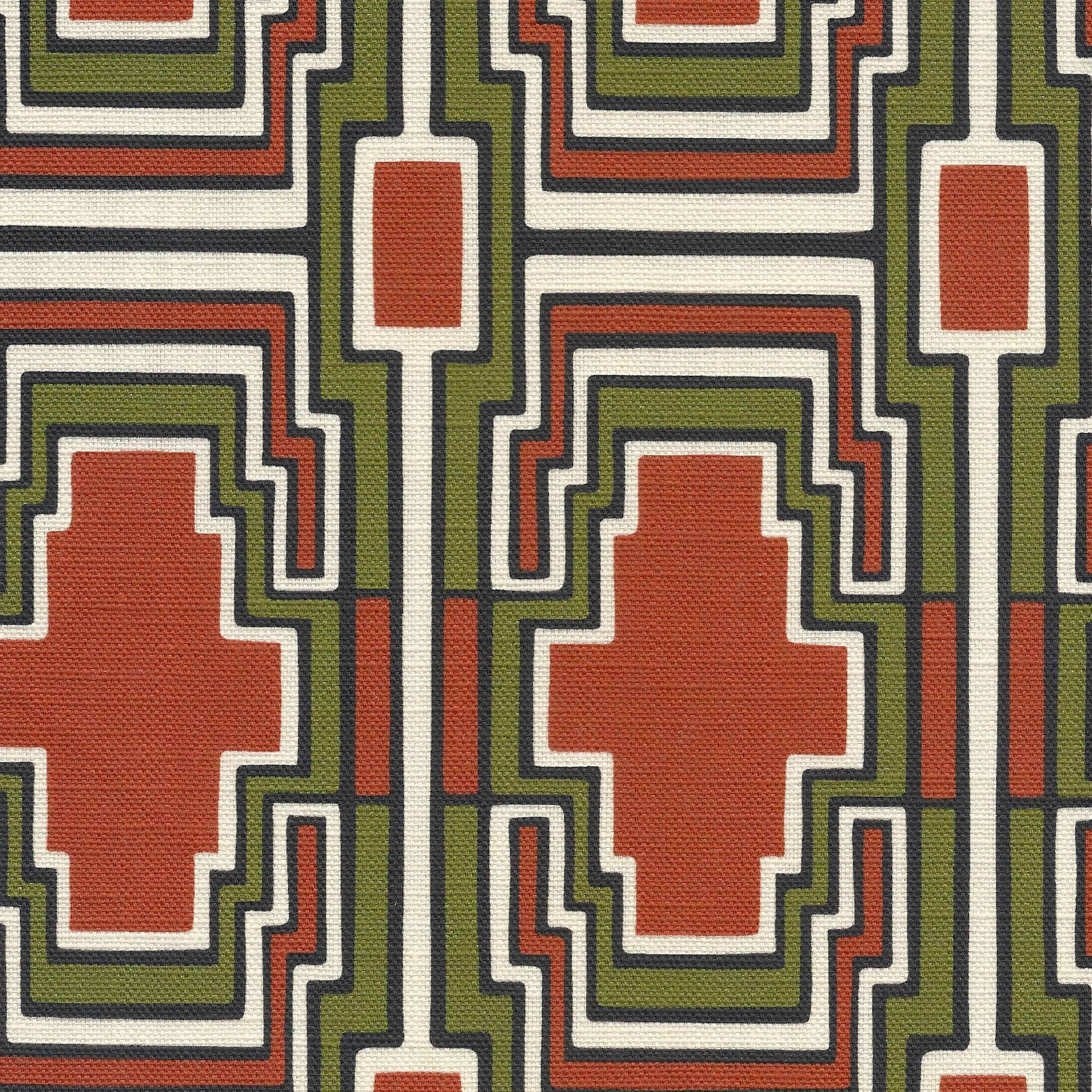 Geometric pattern with terracotta, green, and ivory and black outlines shapes on a fabric background
