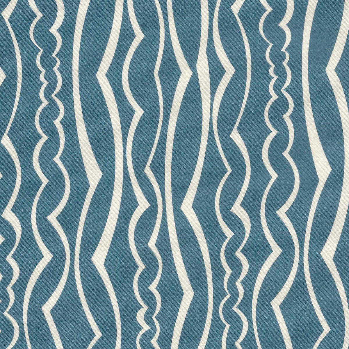 Wavy stripe design featuring ivory stripes on a mid blue ground