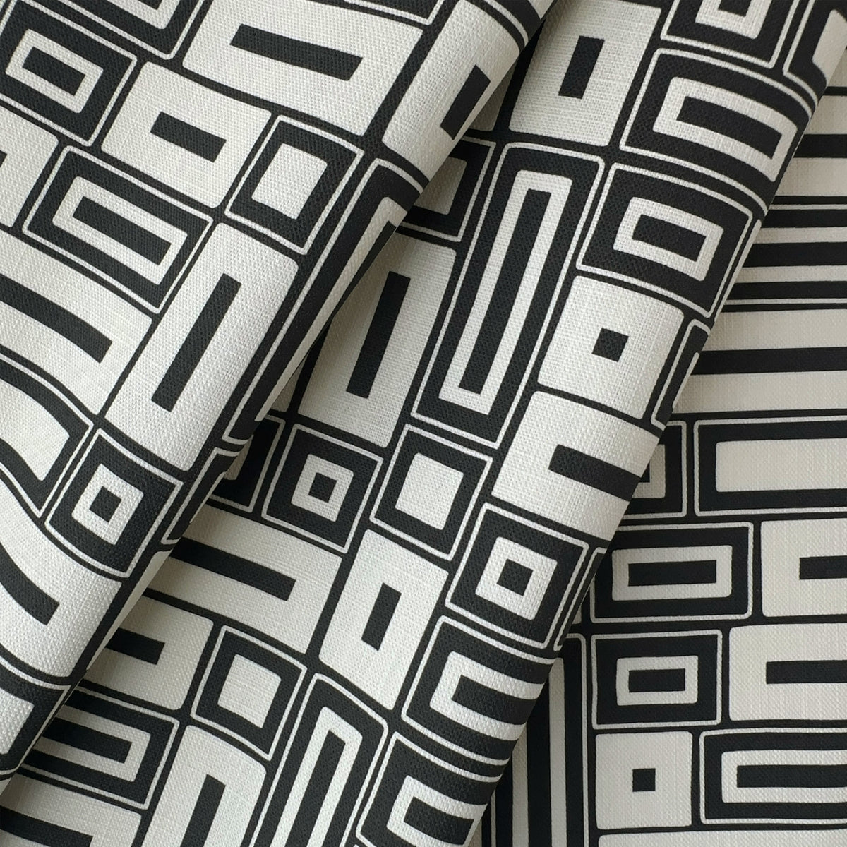 Black and white geometric patterned fabric texture