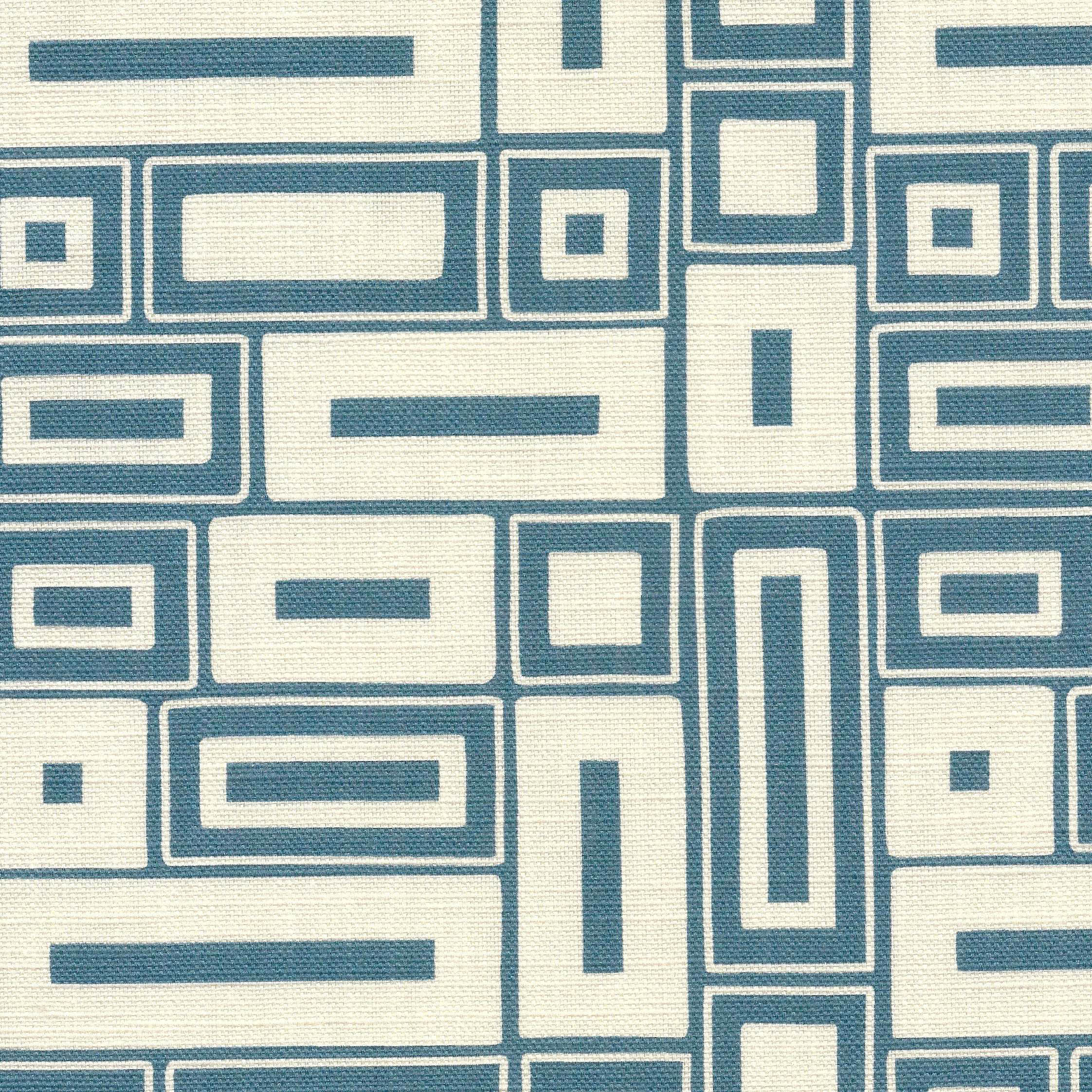 A chalky blue motif on a natural ground, this two-colour fabric has the look of a traditional block-printed design.
