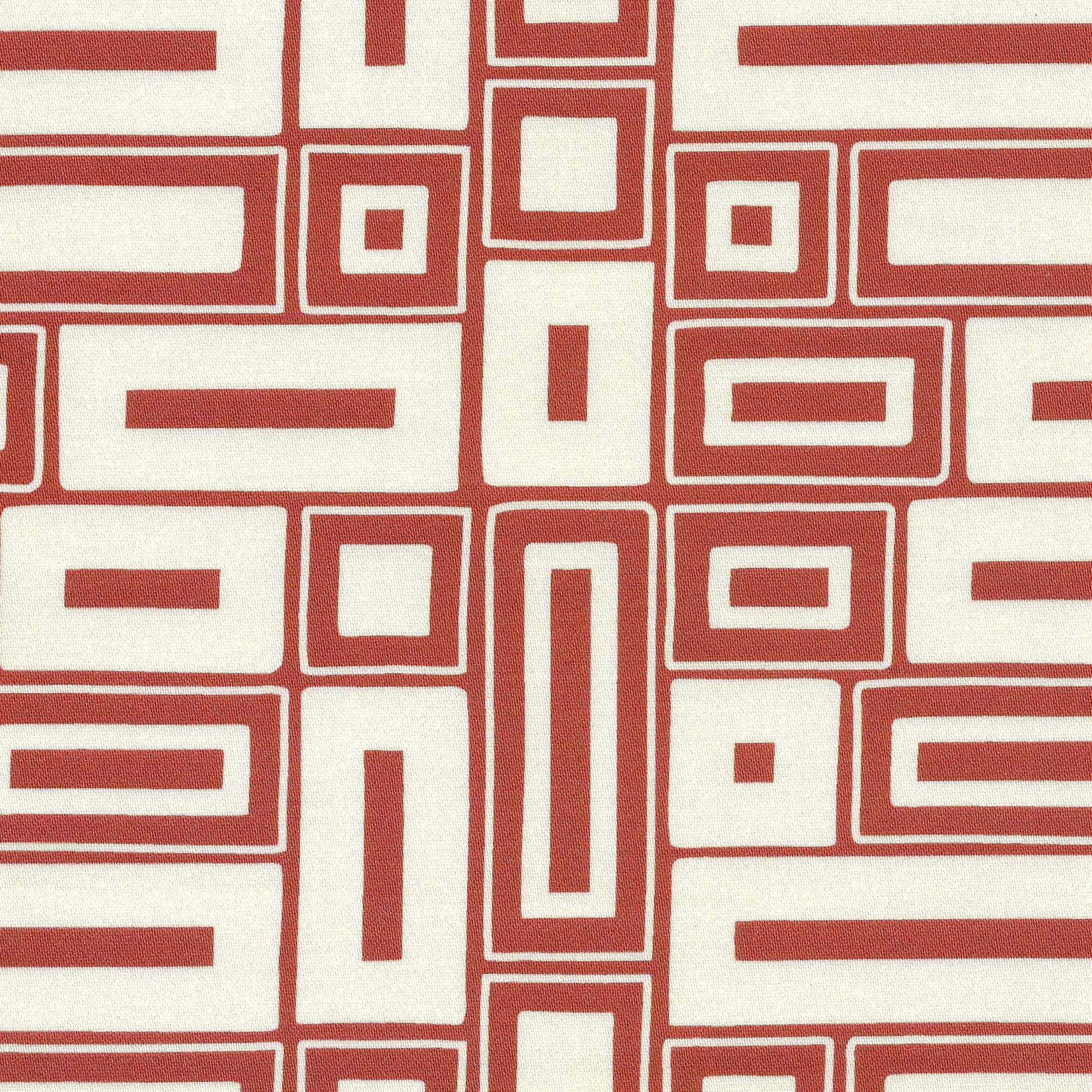 An earthy terracotta motif on a natural ground, this rich two-colour fabric has the look of a traditional block-printed design