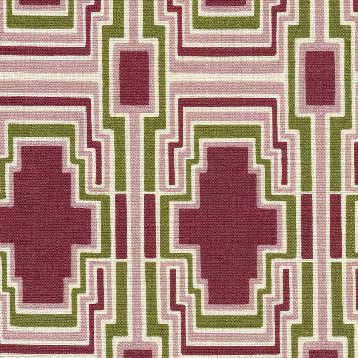 Geometric pattern with maroon, green, and beige shapes on a fabric background