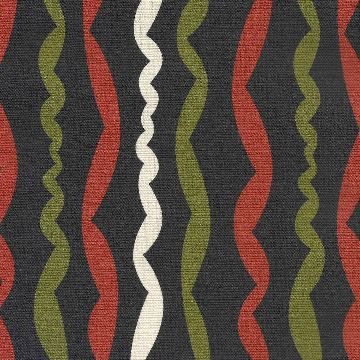printed fabric with wavy pattern in terracotta, green, and white on a black background
