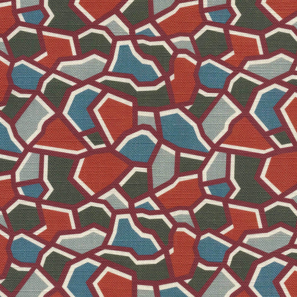 Colorful geometric patterned fabric with terracotta, blue, and green colors outlined in burgundy and ivory.