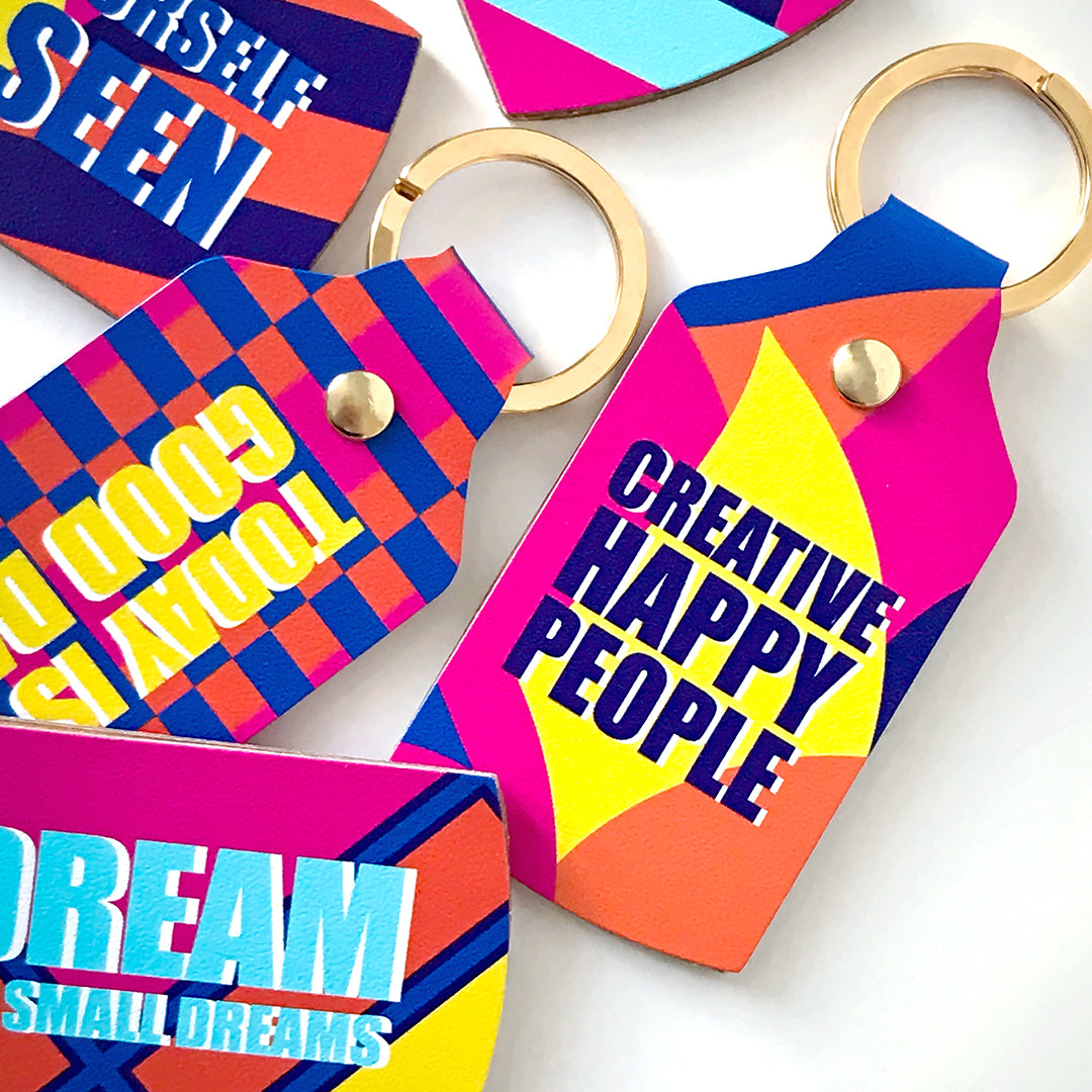 Dream No Small Dreams collection of colourful recycled printed Leather Key rings. Made in the UK.
